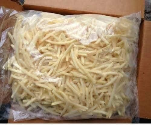 An open carton of frozen French fries