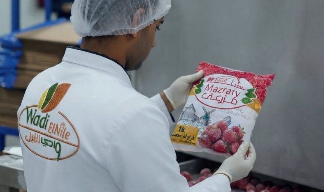 Checking a Mazraty strawberry bag before packing